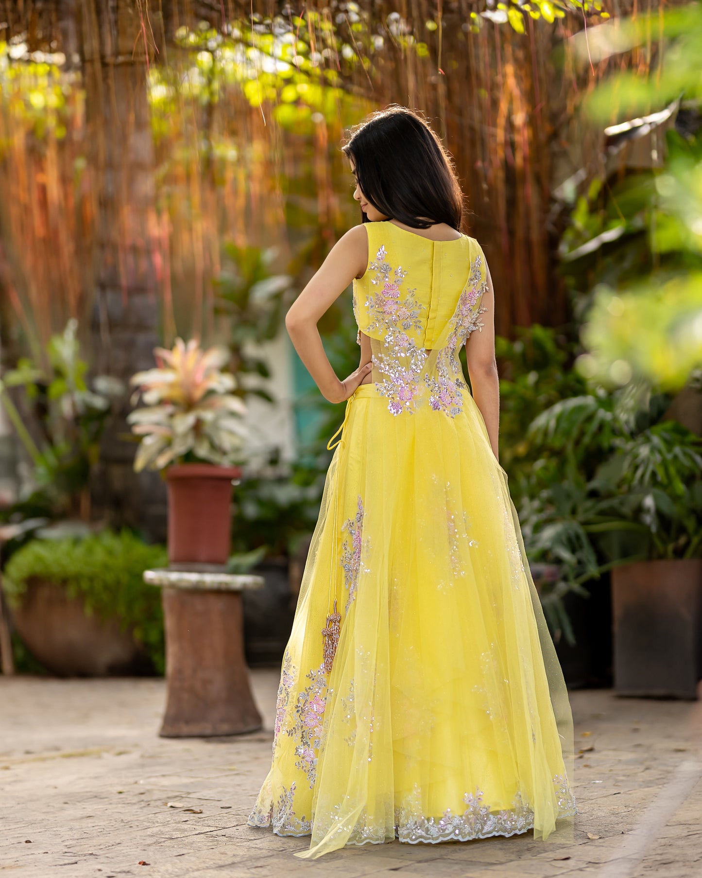 YELLOW NET LEHENGA WITH BUTTAS AND RAW SILK BLOUSE