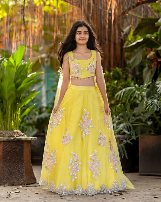 YELLOW NET LEHENGA WITH BUTTAS AND RAW SILK BLOUSE