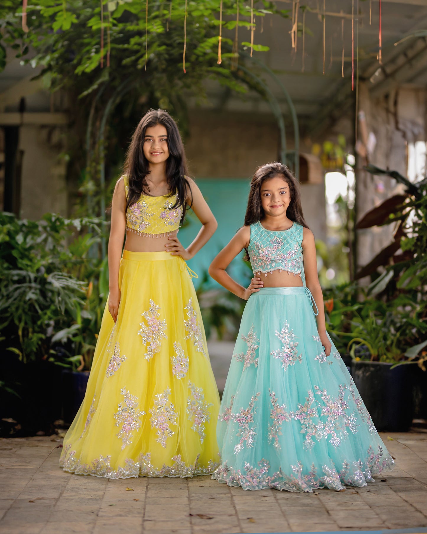 YELLOW NET LEHENGA WITH BUTTAS AND RAW SILK BLOUSE