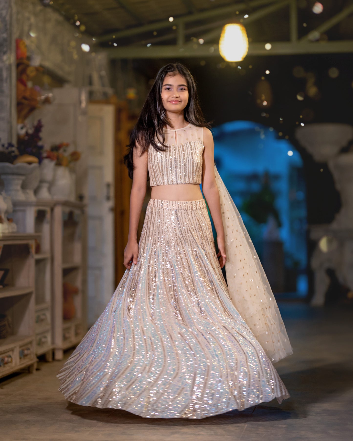 A SILVER AND GOLD SHIMMER LEHENGA
