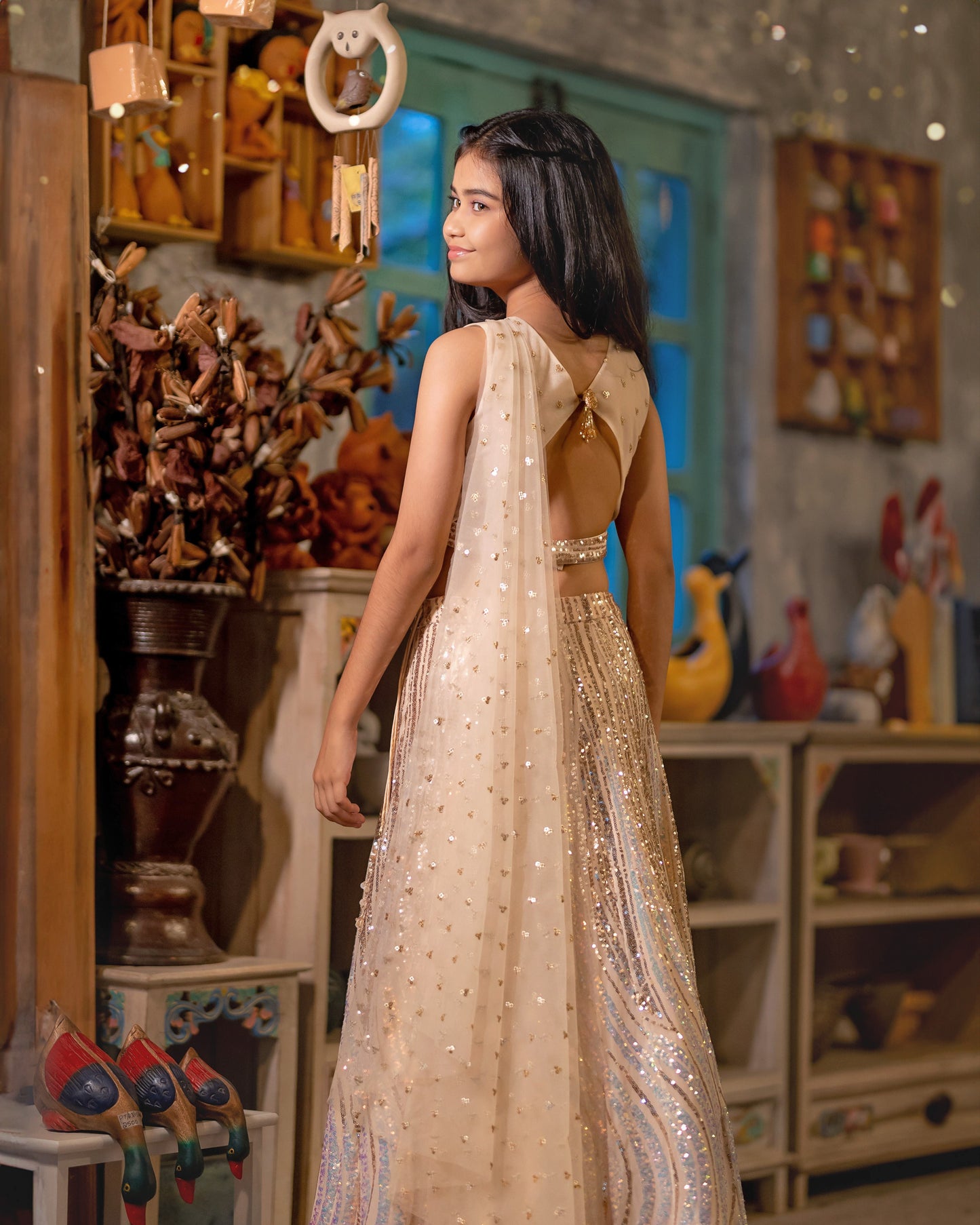 A SILVER AND GOLD SHIMMER LEHENGA