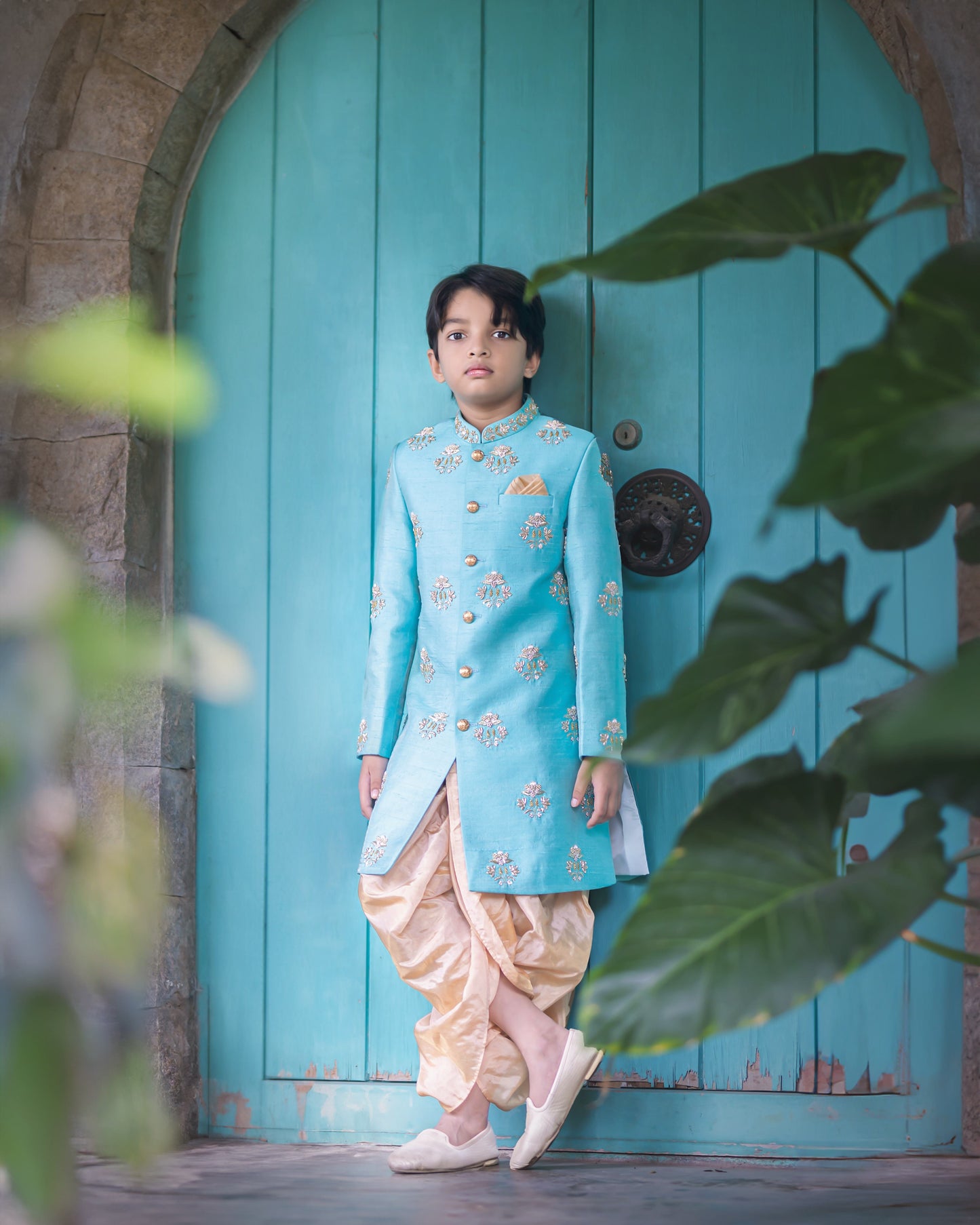 BLUE BUTTI SHERWANI WITH GOLD TISSUE DHOTI