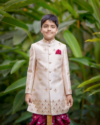 BLUSH PINK TISSUE SHERWANI WITH MAROON BUTTI DHOTI