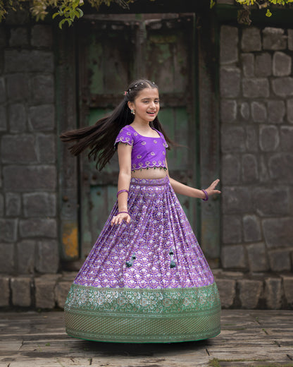 A DARK LAVENDER BANARASI LEHENGA WITH LAVENDER BLOUSE.